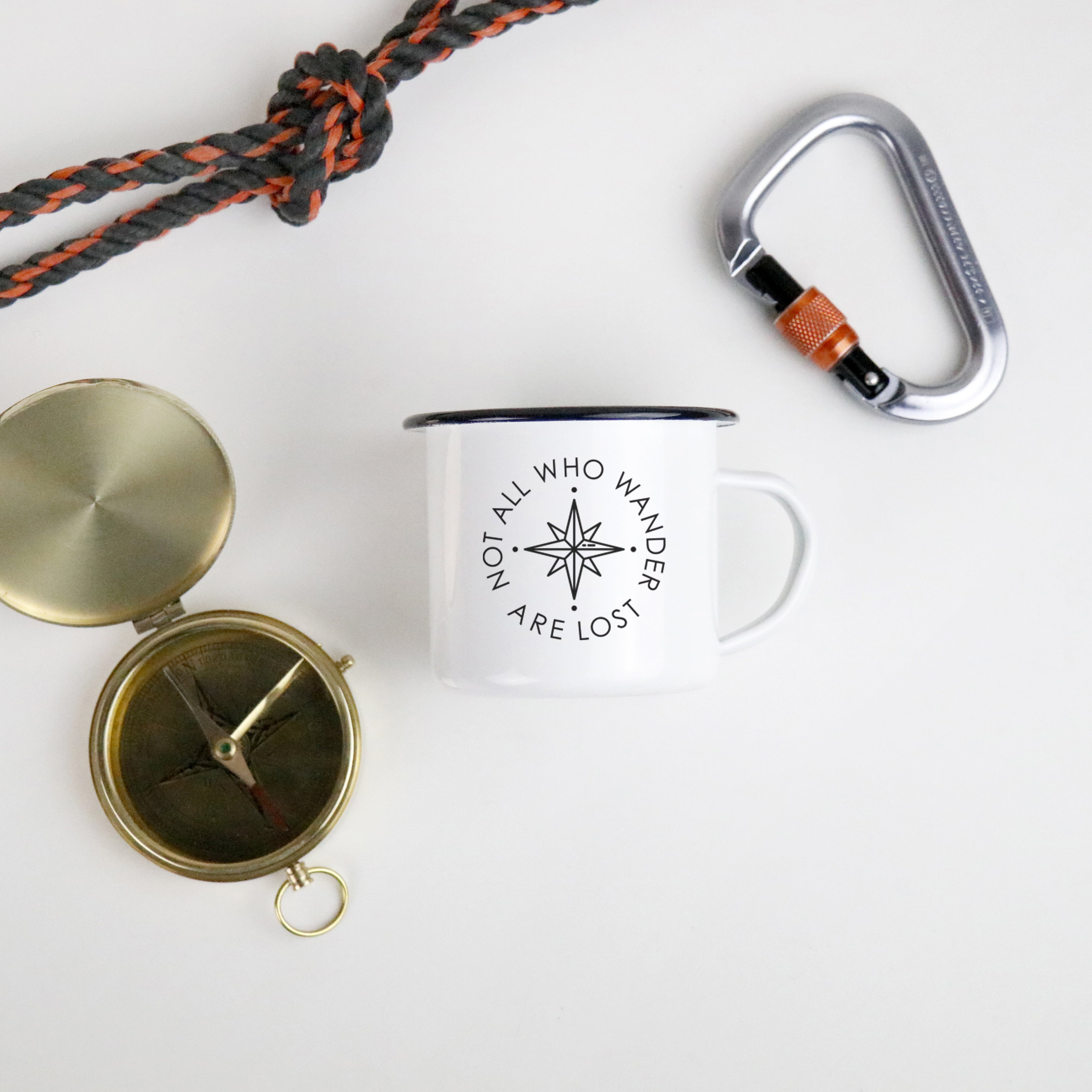 The 'Not All Who Wander Are Lost' Enamel Camping Mug - Cool Compass Version