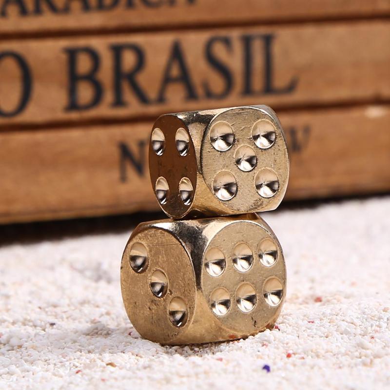 The Coolest Brass Game Dice In Town